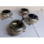 A group of four Victorian silver plated salts together with a silver spoon Location: