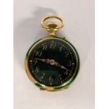 An 18ct gold and green enamelled ladies fob watch A/F inset with diamonds, stamped 18k, total weight