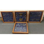A group of four display cases containing Police related enamel pin badges, to include various UK,