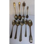 A selection of silver spoons to include a teaspoon inset with a handstone to the handle, 115.8g
