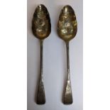 Two early 19th century silver berry spoons, one hallmarked London 1930, 121.5g Location: