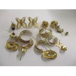 A collection of yellow metal earrings together with a pair of 9ct gold rope twist earrings Location: