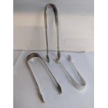 Three silver sugar tongs to include one hallmarked London 1822, 108.6g Location: