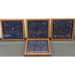 A group of four display cases containing Police related enamel pin badges, to include Northern