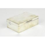 A George V silver cigarette box by the Goldsmiths & Silversmiths Co Ltd, London 1916, of rectangular