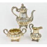 A Victorian silver three piece matching tea set, the teapot by the Goldsmiths Alliance