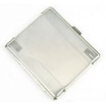 A George V silver cigarette case by Asprey & Co Ltd, 1933 Chester, of rectangular form with engine