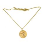A 9ct yellow gold zodiac Sagittarius sign pendant on chain by Paul Vincze, the circular pendant with