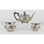 A George V silver three piece tea set by Charles Henry Hattersley, Sheffield 1912, comprising a