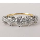 An 18ct gold and five stone diamond ring, approx 1.5ct total, with graduated brilliant cut