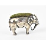 A Victorian or Edwardian silver novelty pin cushion, hallmarks rubbed, modelled as an elephant