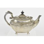 A Victorian silver teapot by James Dixon & Sons Ltd, London 1892, with part fluted body,