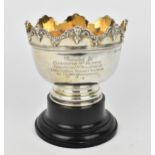 An Edwardian silver trophy bowl on stand by Cohen & Charles, London 1907, designed as a monteith