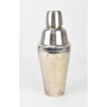 An Art Deco silver cocktail shaker, circa 1920, of tapered cylindrical form, the lid with a