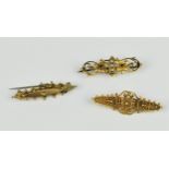 A collection of three Victorian gold brooches, to include one 15ct yellow gold Etruscan revival