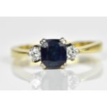 An 18ct yellow gold, white metal, sapphire and diamond ring, with central rectangular cut sapphire