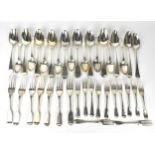 A large collection of Georgian and Victorian silver flatware, to include tablespoons, dinner