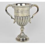 A George V silver twin-handled trophy cup by Atkin Brothers, Sheffield 1913, inscribed 'Little