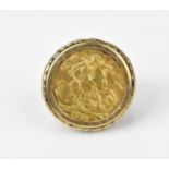An Elizabeth II full gold sovereign coin mounted in a gentleman's Modernist yellow metal ring
