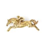 A 9ct yellow gold horse & jockey brooch, 4.5 cm wide, with roll catch fastener, weight 12.9 grams