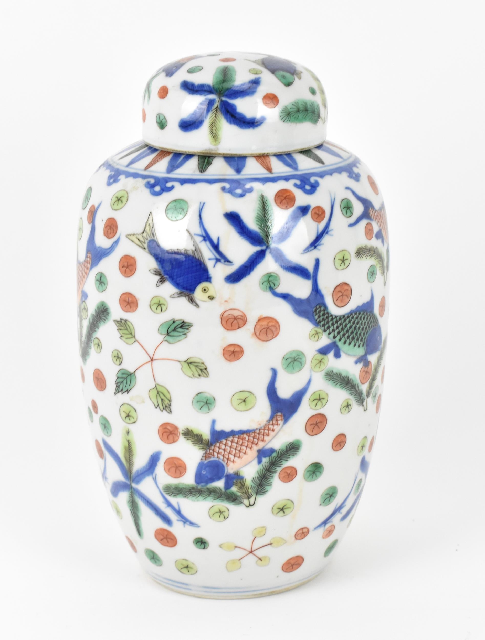 A Chinese Qing dynasty wucai porcelain lidded vase, 19th century or possibly earlier, of ovoid