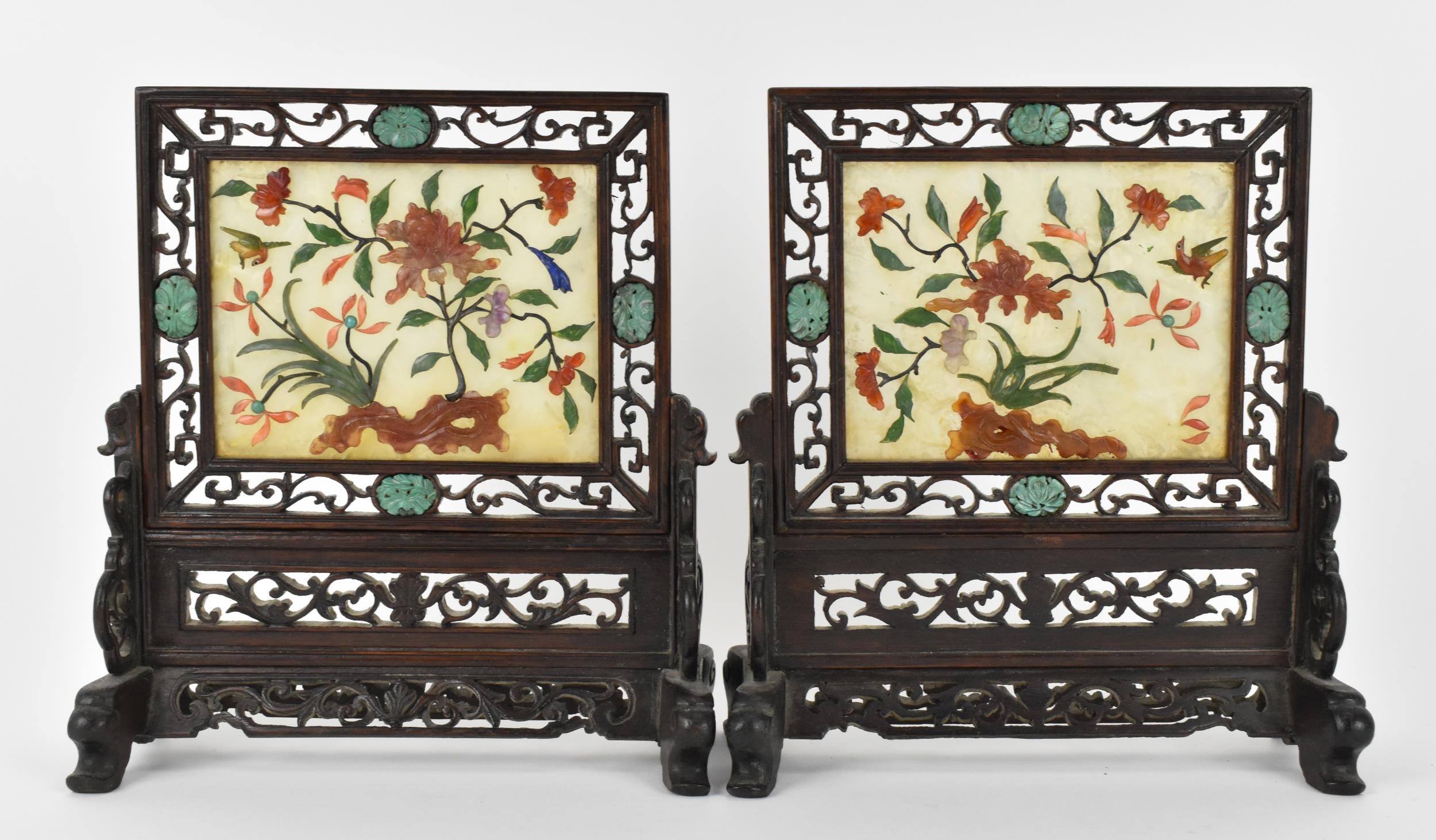 A pair of Chinese jade and hardstone table screens, early 20th century, each with central