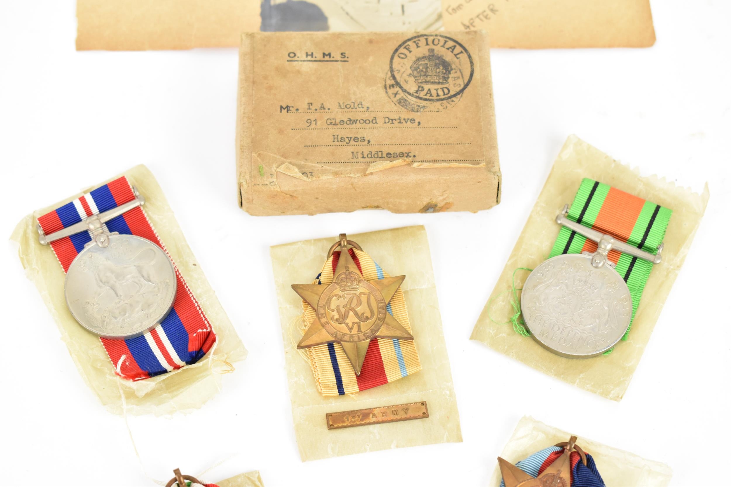 WWII - a set of British WWII medals to include 1939-1945 Defence medal 1939-1945 war medal, Italy - Image 3 of 7