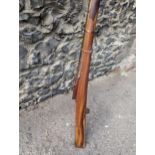 A 19th century large Indian Toradar, Matchlock musket having a 135cm barrel, with ram rod, inscribed