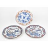 Three Chinese 18th century porcelain plates, to include two of octagonal form with willow pattern