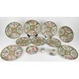 A set of six Chinese Canton export porcelain plates, late Qing dynasty, in the Famille Rose