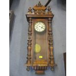 A late 19th/early 20th century mahogany Vienna style regulator wall clock (with pendulum and key),