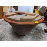 A vintage glazed mixing bowl with a pine lid