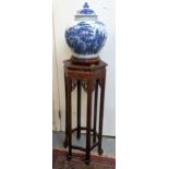 A late 20th century Chinese blue and white vase and cover decorated with a continuous landscape, a