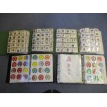 An extensive collection of enamel bowling badges circa 1970's to 1990's mounted in four albums