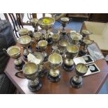 A collection of Badingham College silver and silver plated sports trophies and medals, along with