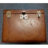 Hermes-A vintage brown leather travelling case 8" high x 10" wide x 4" deep having silver tone