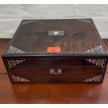 A 19th Century rosewood and inlaid sewing box with fitted compartments, mother of pearl cotton reels