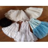 Six 20th Century netted, cotton and lace underskirts in various lengths, colours and sizes, most