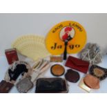 A selection of ladies accessories to include a white metal chain purse, fans, a mid 20th Century