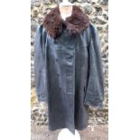 German Uniform - German Officers overcoat. Black leather with utility buttons and brown fur lined