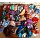 A quantity of vintage fashion scarves to include chiffon and satin examples together with satin
