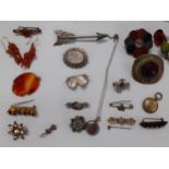 Vintage costume jewellery to include early 20th Century white metal and silver brooches together