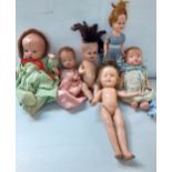 A collection of 20th century dolls to include Heuback Koppelsdorf and Shirley Temple Location: 8:1