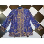 An Indian blue ground cotton evening jacket by Burlington, Bombay, having gold metallic thread