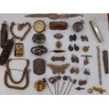 A quantity of Victorian and later costume jewellery and hat pins to include a micro-mosaic pendant