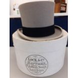 A vintage Locke & Co grey felt top hat in original box, 8" front to back, 6.25" side to side, 53cm
