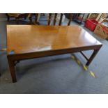 A reproduction mahogany rectangular coffee table by Mires of Downley, 46cm H x 122 cm W. Location: