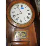 A late 19th century walnut and marquetry American drop dial clock, with a visible pendulum Location: