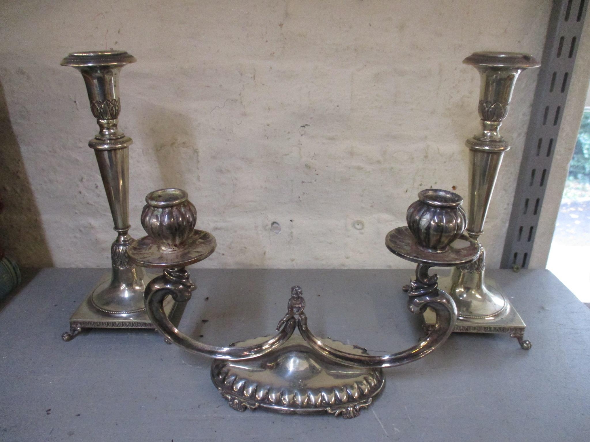 Pair of Italian silver candleholders with leaf decoration, square bases on paw feet, stamped '800'