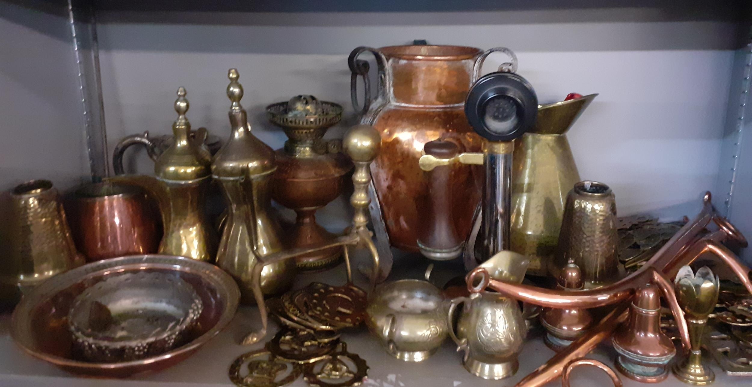 A quantity of copper and brass to include Turkish coffee pots, horse brasses and a vintage upright